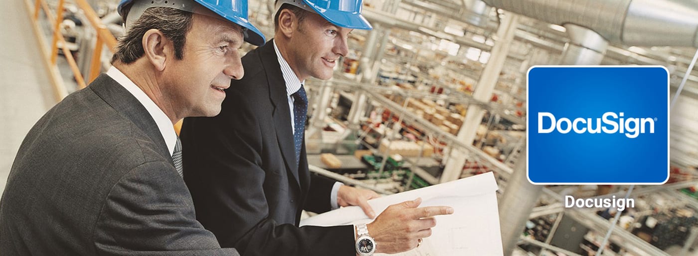 Business men warehouse hardhats